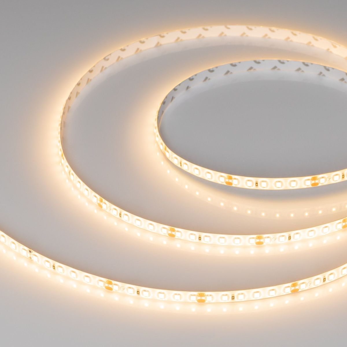 Светодиодная герметичная лента Arlight RTW-SE-A120-8mm 24V Warm2700 (9.6 W/m, IP65, 2835, 5m) 055405
